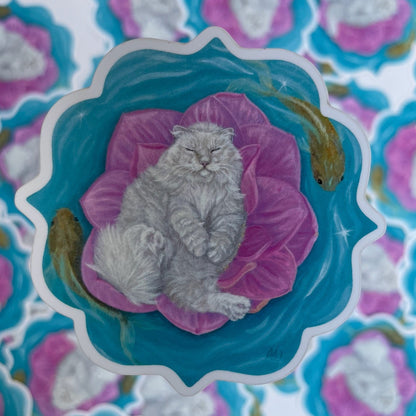 Sticker of a cat on a pink lotus flower with a blue border, surrounded by similar floral stickers.