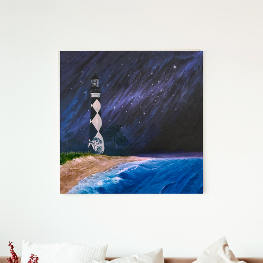 Painting of a lighthouse on a beach with a starry night sky.