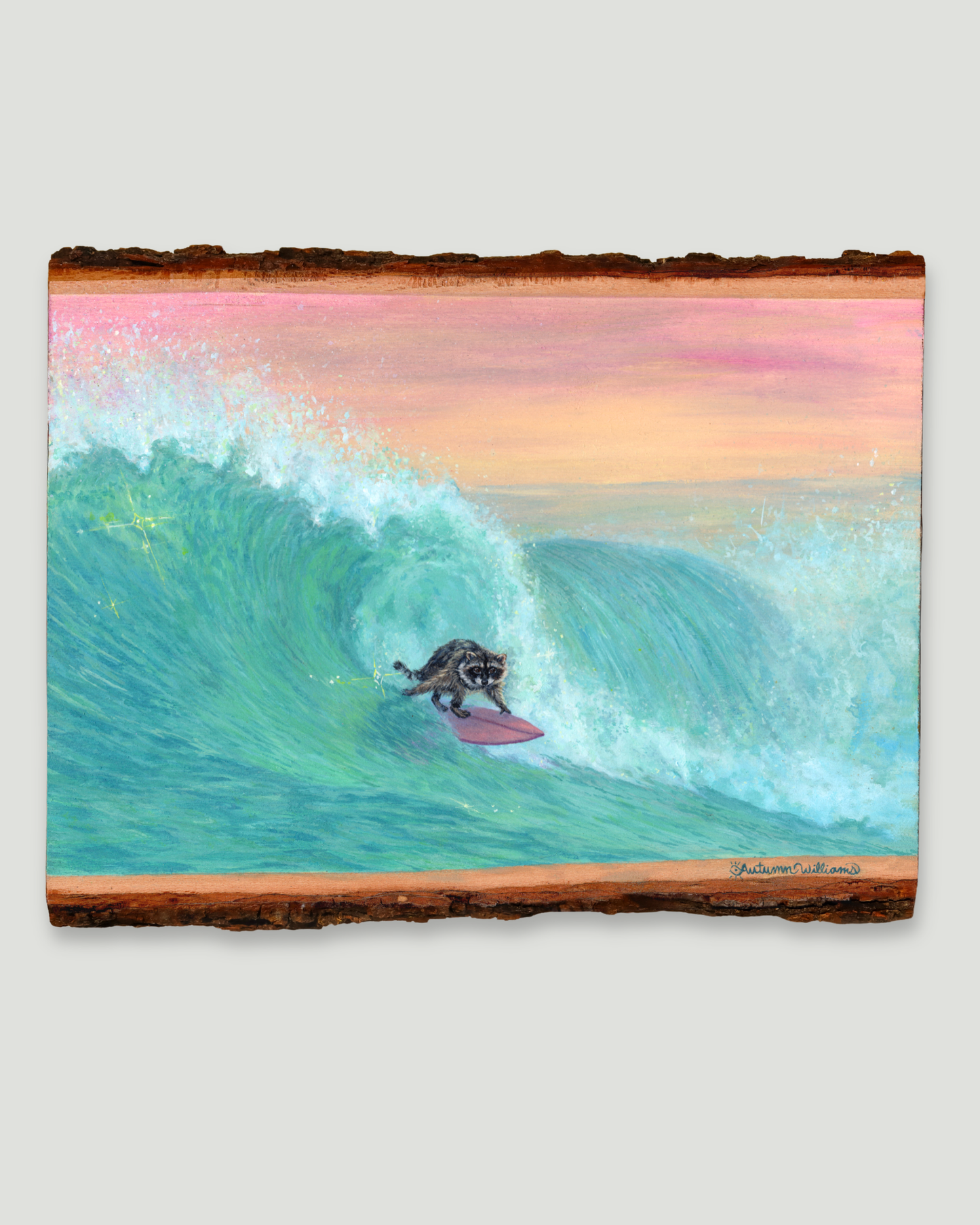 A painting on live edge wood slab depicting a raccoon surfer riding a large turquoise wave under a pink and peach sky, mounted against a light gray background.