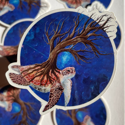 Sticker with a tree and turtle design on a blue background, surrounded by other similar stickers.
